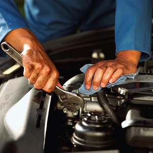 Mechanic Servicing a car engine