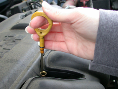 Oil checking metal rod