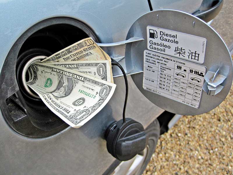 Money on the in-let of the fuel tank.