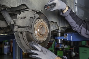 Man repairing braking system
