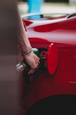 man filling petrol