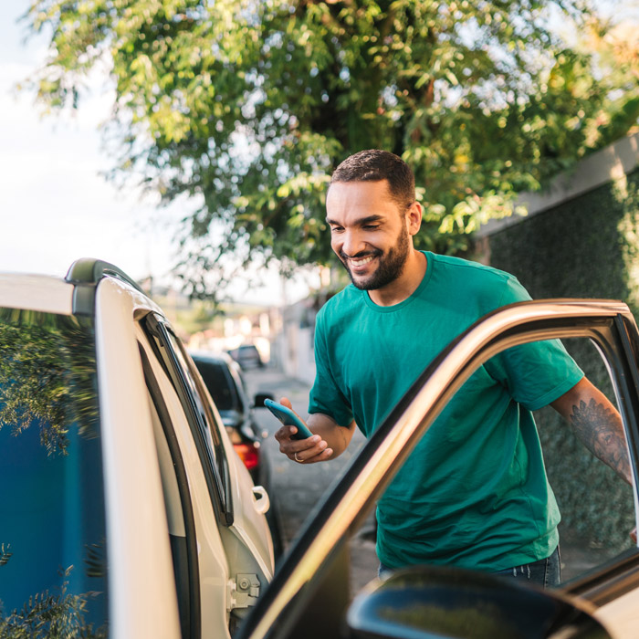 man opening car door
