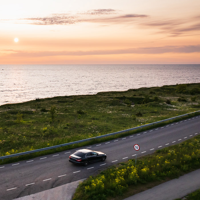 car driving down highway
